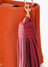 Bandolera Efecto Piel con Pompones a Contraste Naranja Lola Casademunt