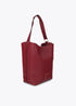 Shopper Efecto Piel con Pompones a Contraste Burdeos Lola Casademunt