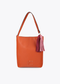 Shopper Efecto Piel con Pompones a Contraste Naranja Lola Casademunt