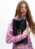 Cartera de mano acolchada de efecto piel metalizada con logo LC ovaladO LOLA CASADEMUNT NEGRO LF2504025.00N.U