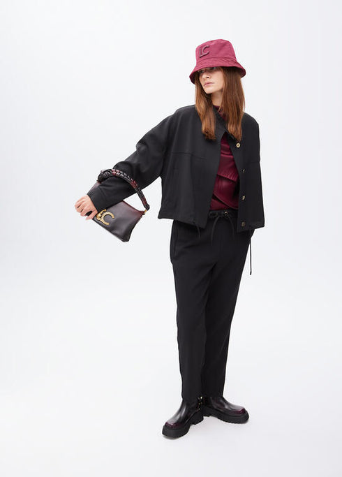 Bandolera con solapa y nudo en asa. Logo LC leopardo LOLA CASADEMUNT NEGRO-ROJO LF2504030.2N3.U