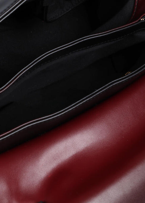 Bandolera con solapa y nudo en asa. Logo LC leopardo LOLA CASADEMUNT NEGRO-ROJO LF2504030.2N3.U