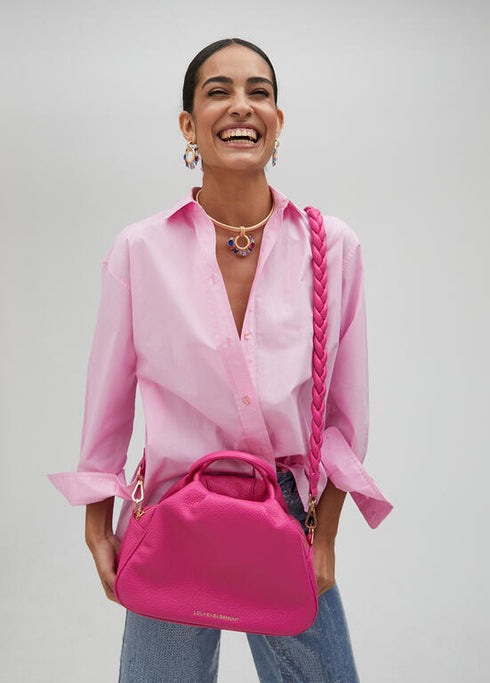 Bandolera LOLA CASADEMUNT asas trenzadas efecto piel granulada FUCSIA