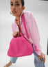 Bandolera LOLA CASADEMUNT asas trenzadas efecto piel granulada FUCSIA