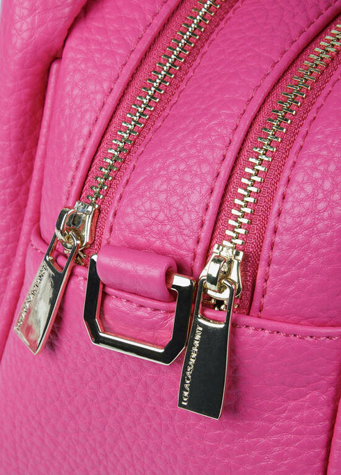 Bandolera LOLA CASADEMUNT asas trenzadas efecto piel granulada FUCSIA