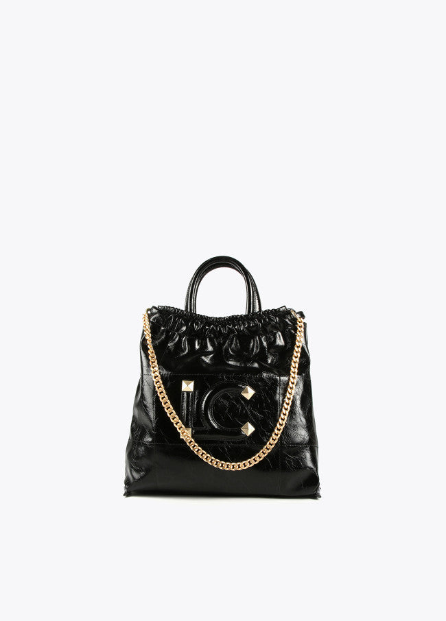 Bolso efecto piel brillante con LC y tachas NEGRO